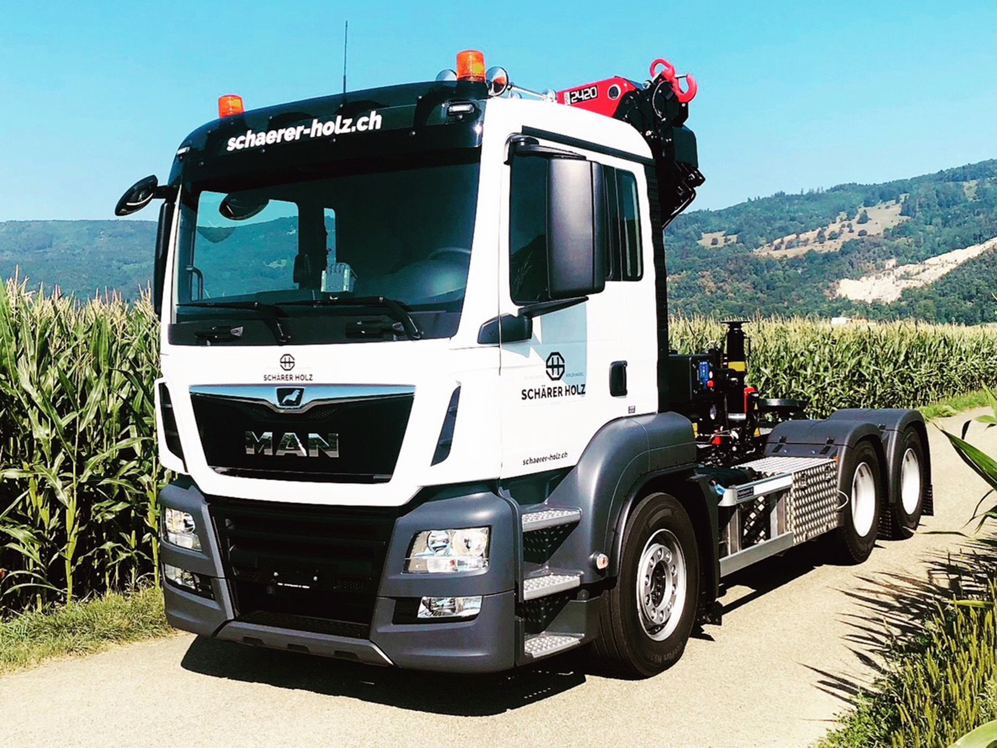 Transport- und Kranfahrzeug MAN TGS 26.460 6×4 Schärer Holz AG